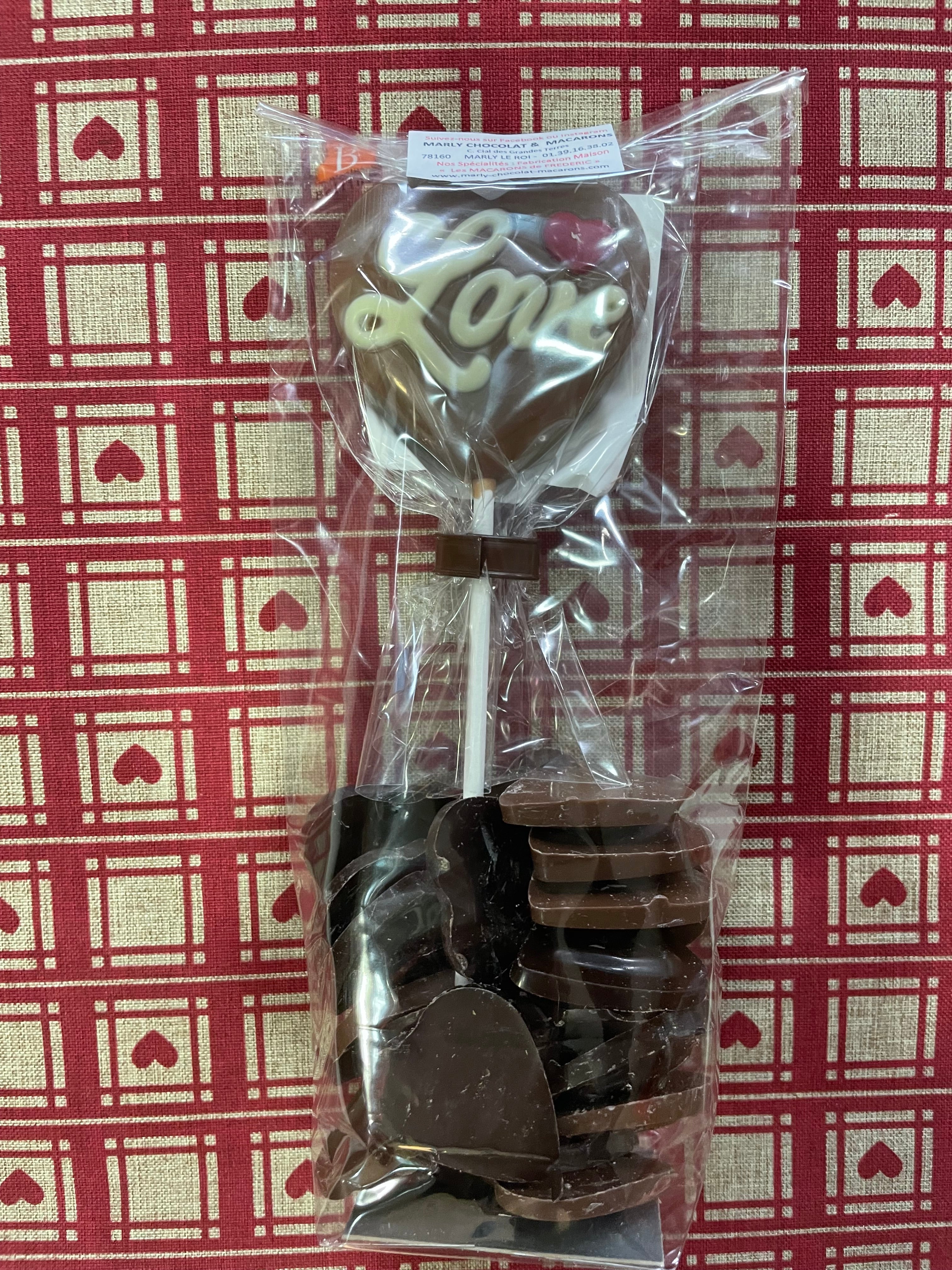 Sachet petits cœurs en chocolat + sucette Saint Valentin